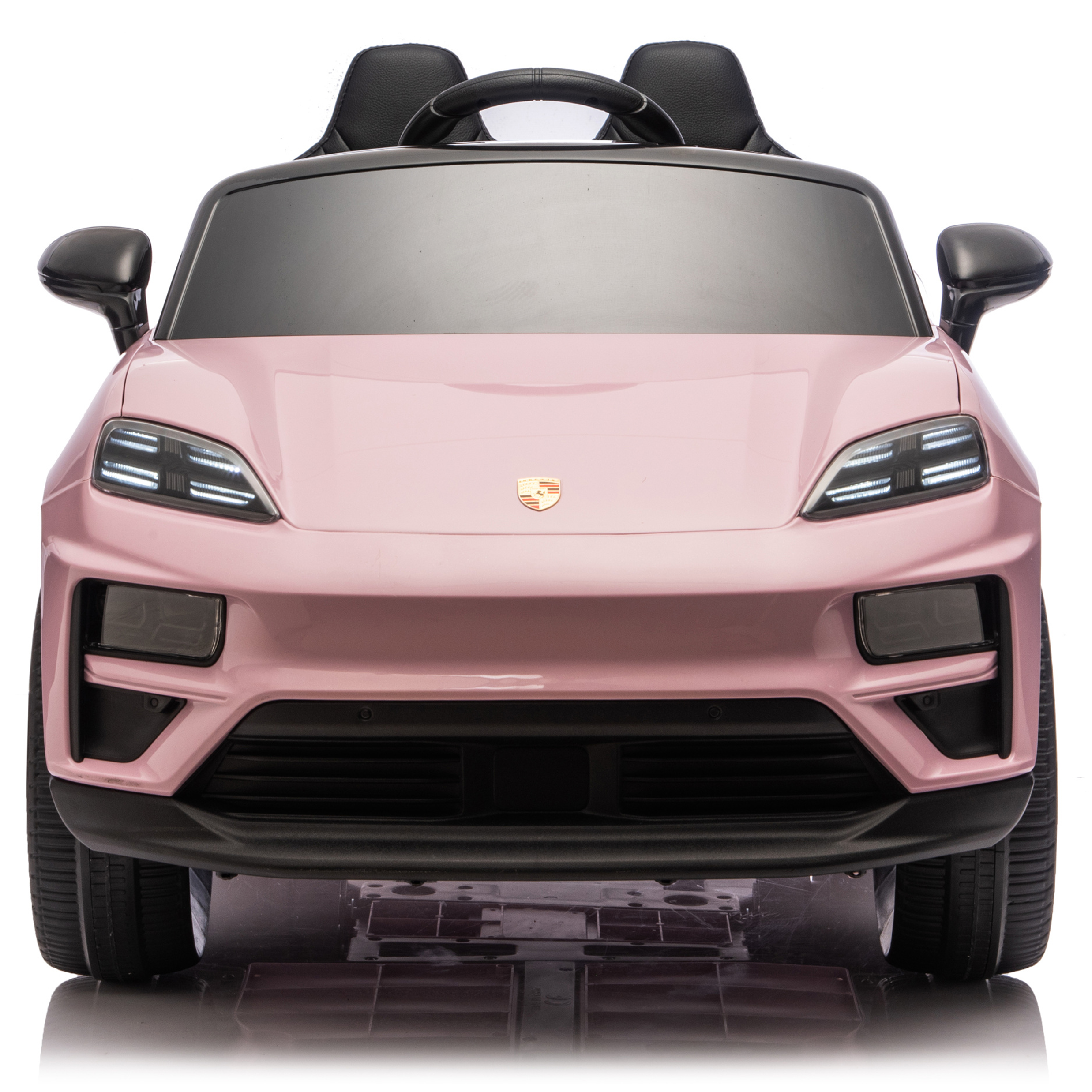 Pink toy car with Porsche logo on a white background