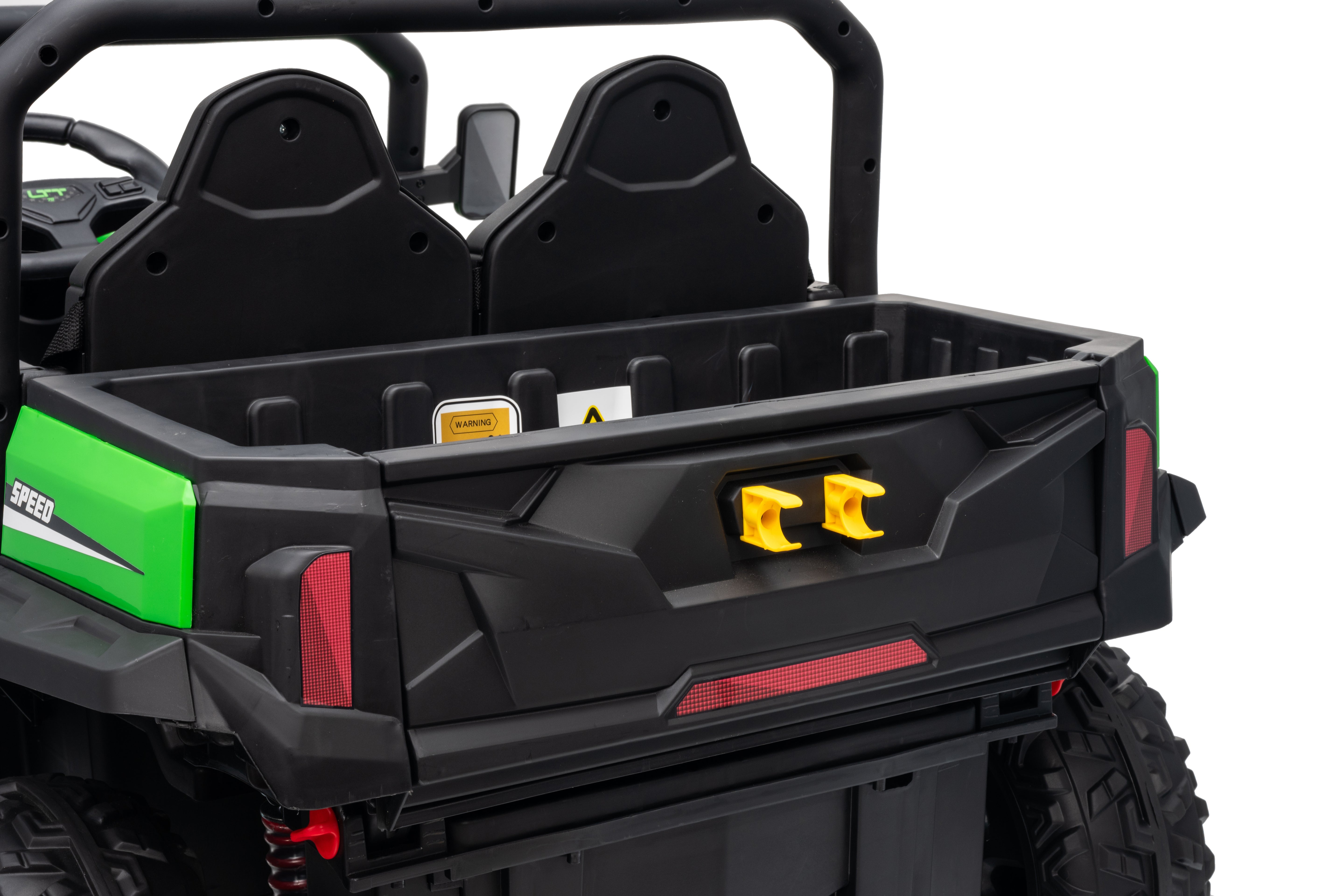Back of a black utility vehicle with a green side panel on a white background