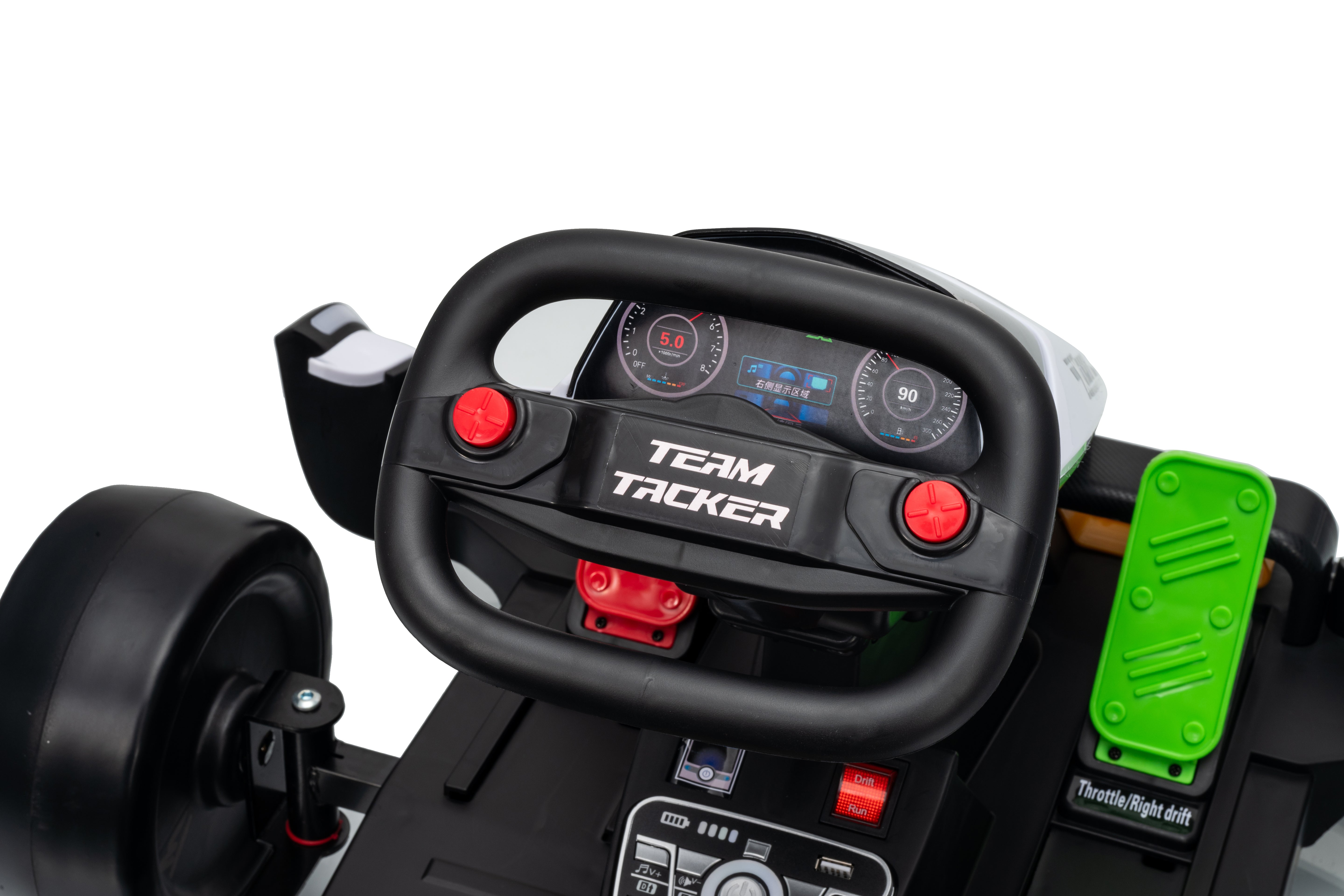 Steering wheel and dashboard of a toy car with 'Team Tacker' branding on a white background