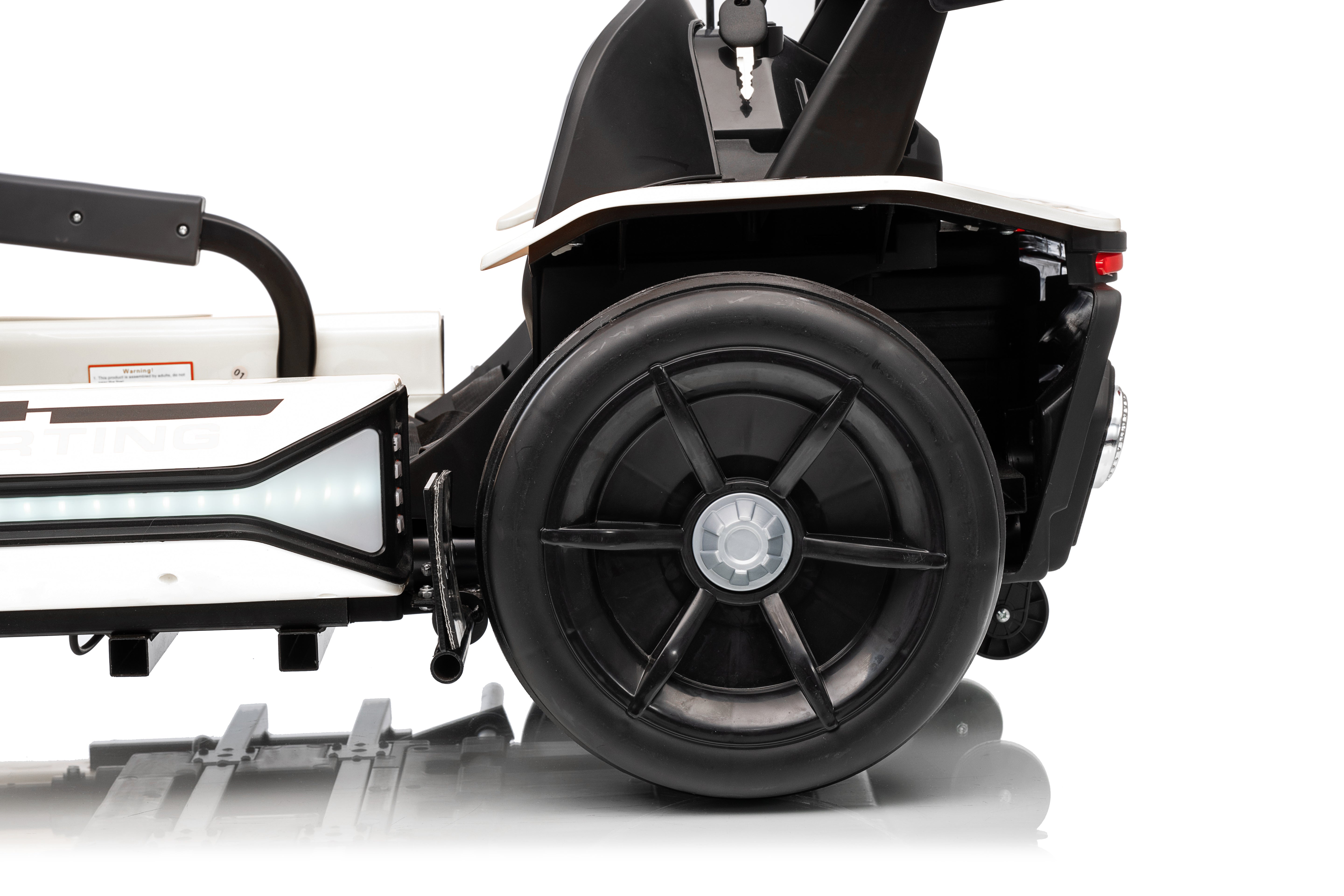 Close-up of a wheel with a black rim and tire on a white background