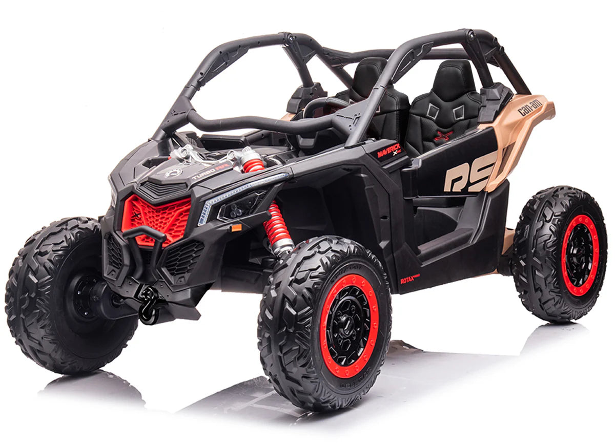 An orange and black Can-Am Maverick kids' electric buggy with large off-road tires and a rugged design.