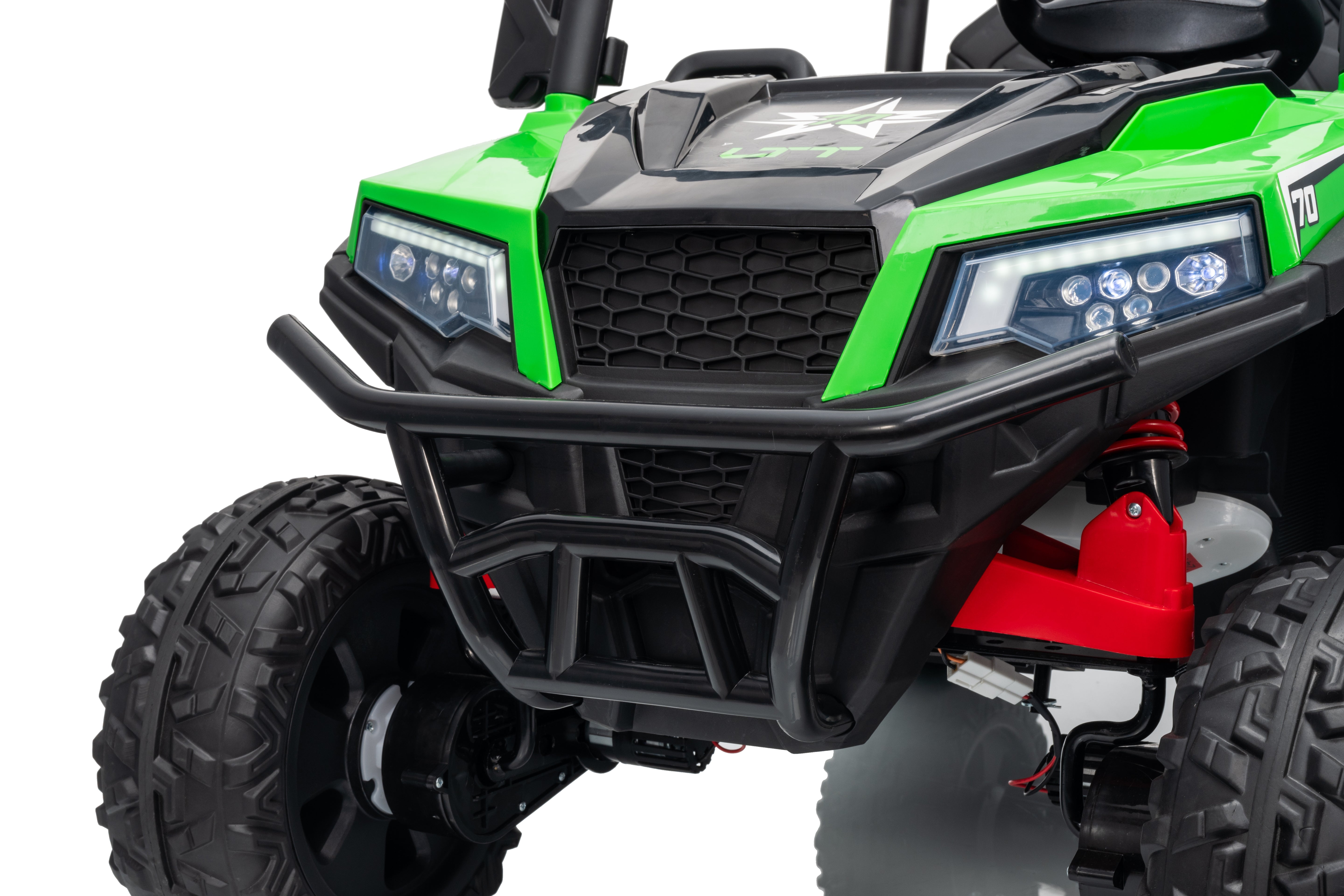 Close-up of a green and black ATV with red accents on a white background