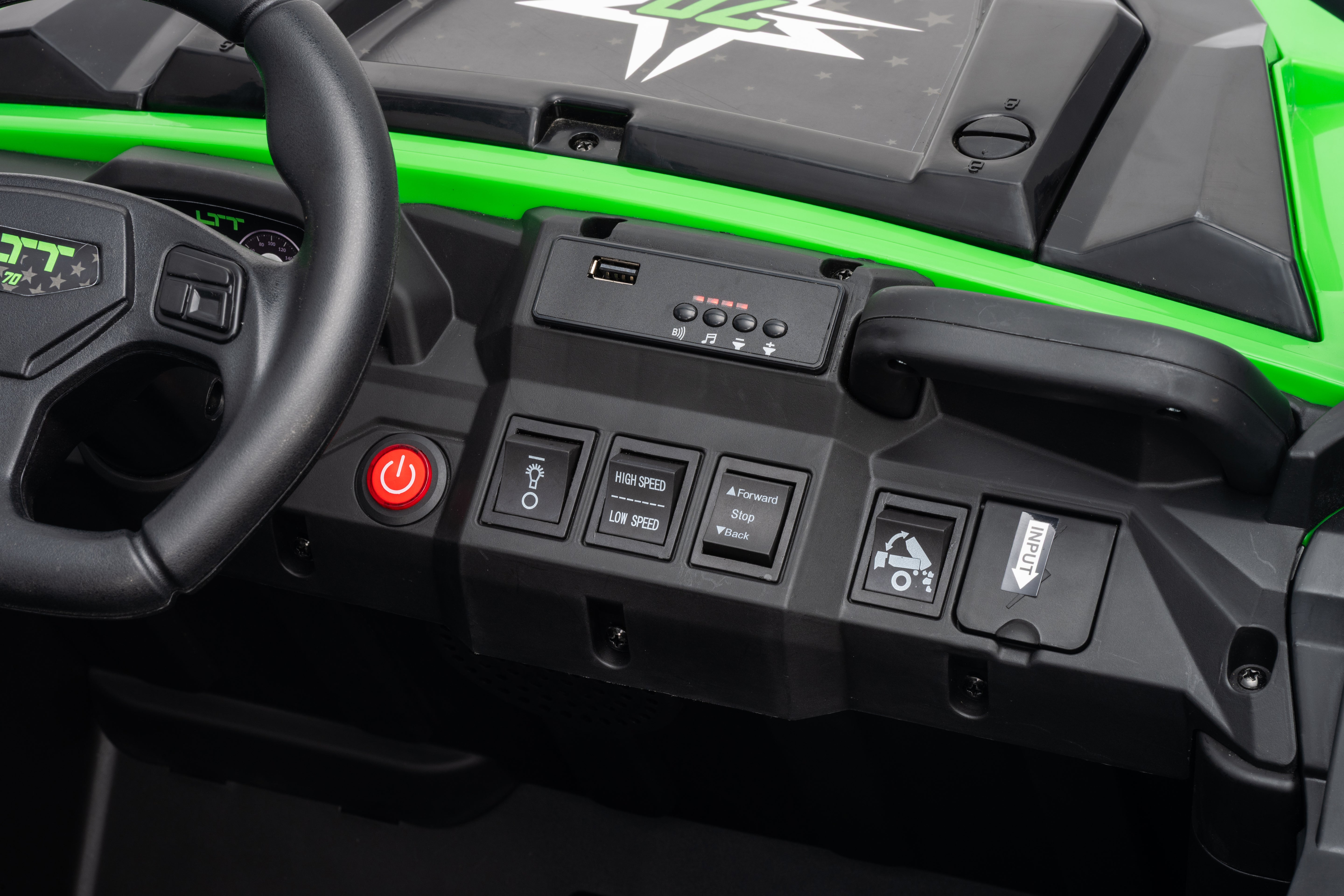 Control panel of a vehicle with green accents and various buttons.