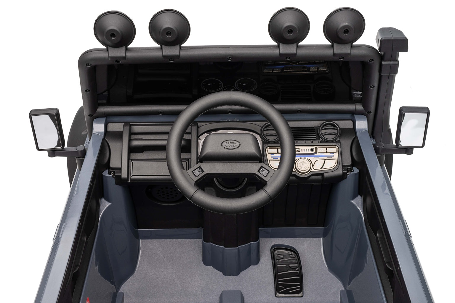 Dashboard and steering wheel of the licensed 24V Land Rover Defender ride-on kids electric vehicle.