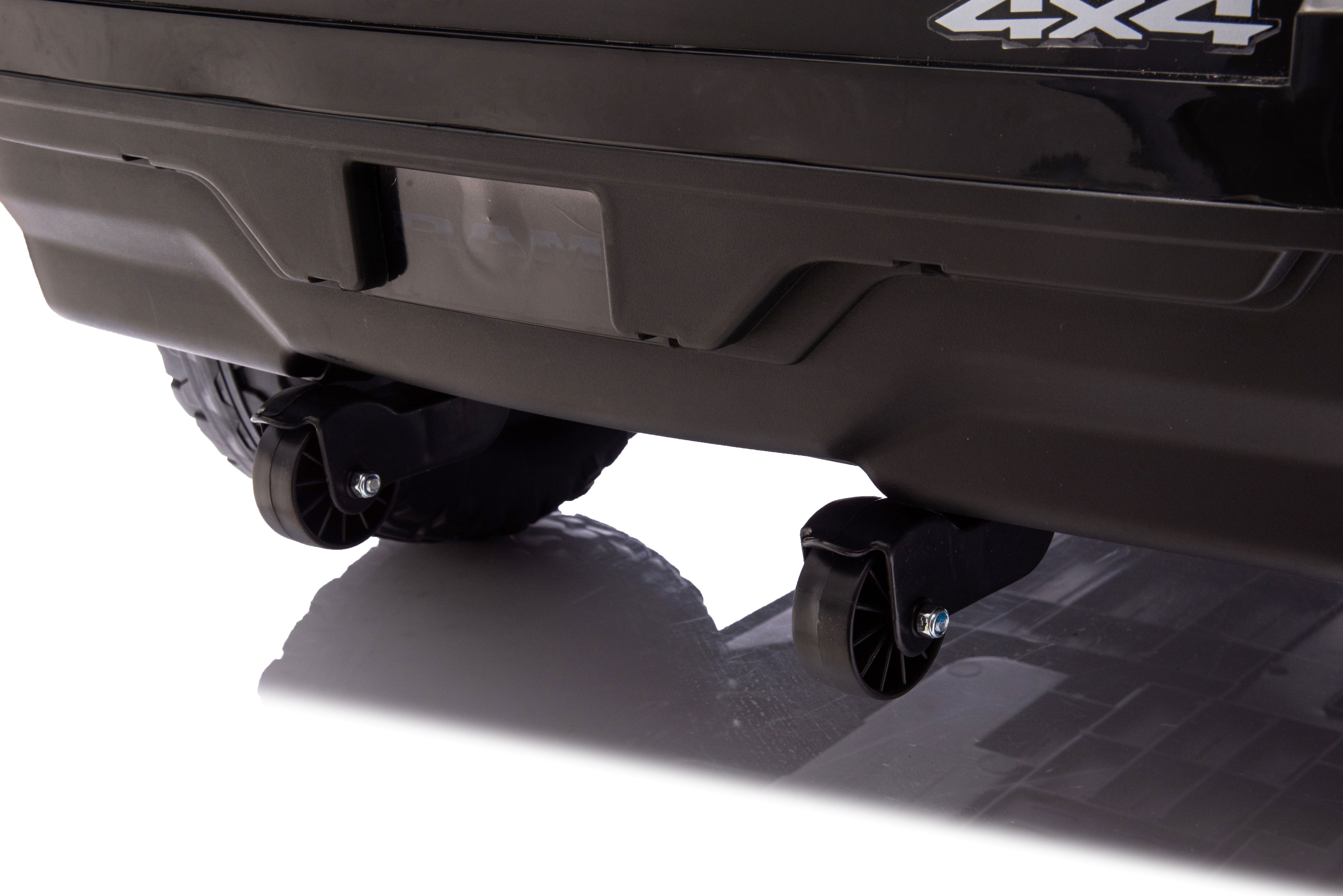Rear tow wheels of the Licensed Dodge RAM 1500 Police Ride-On Kids Electric Car 4WD
