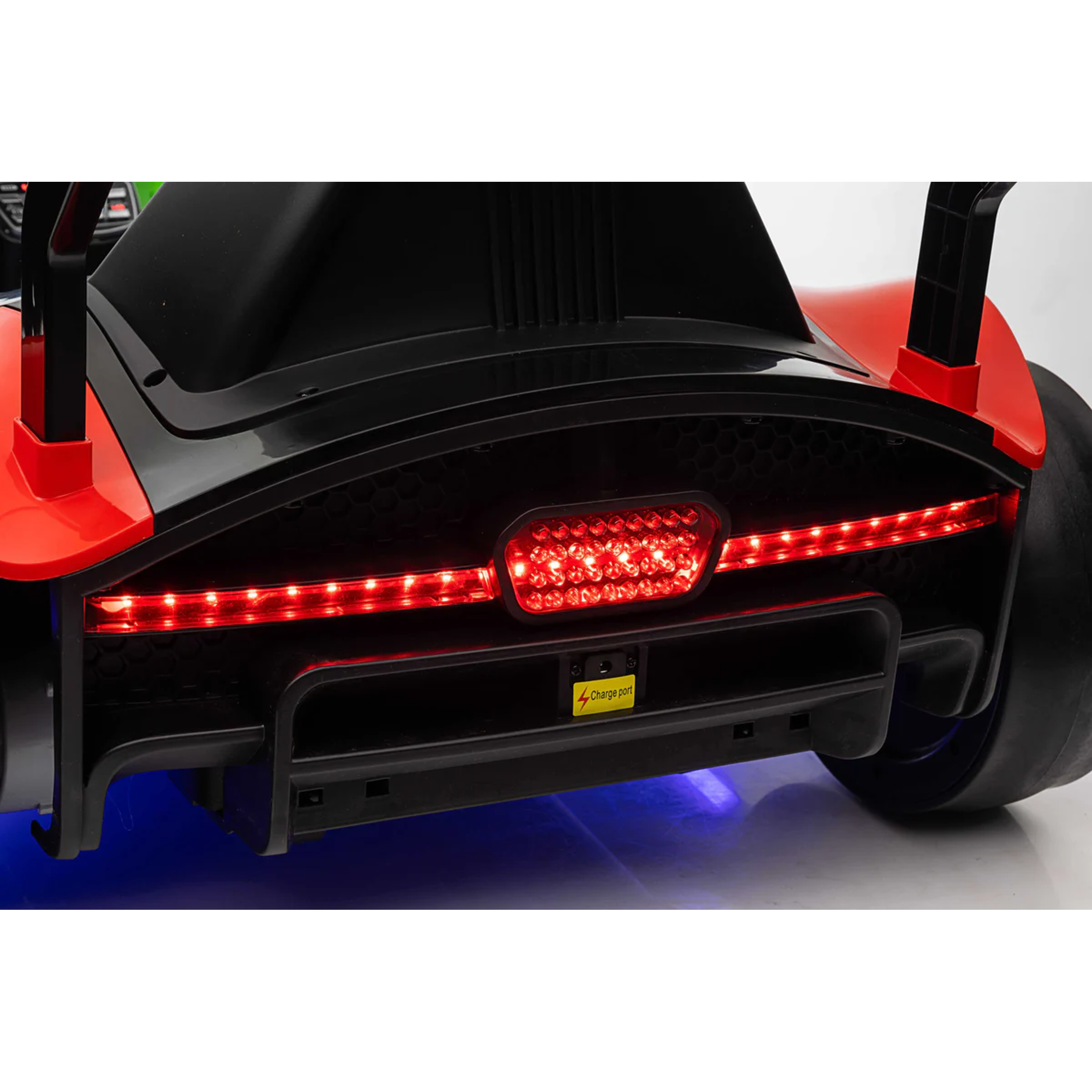 Close-up of a vehicle's rear with red LED lights on a white background