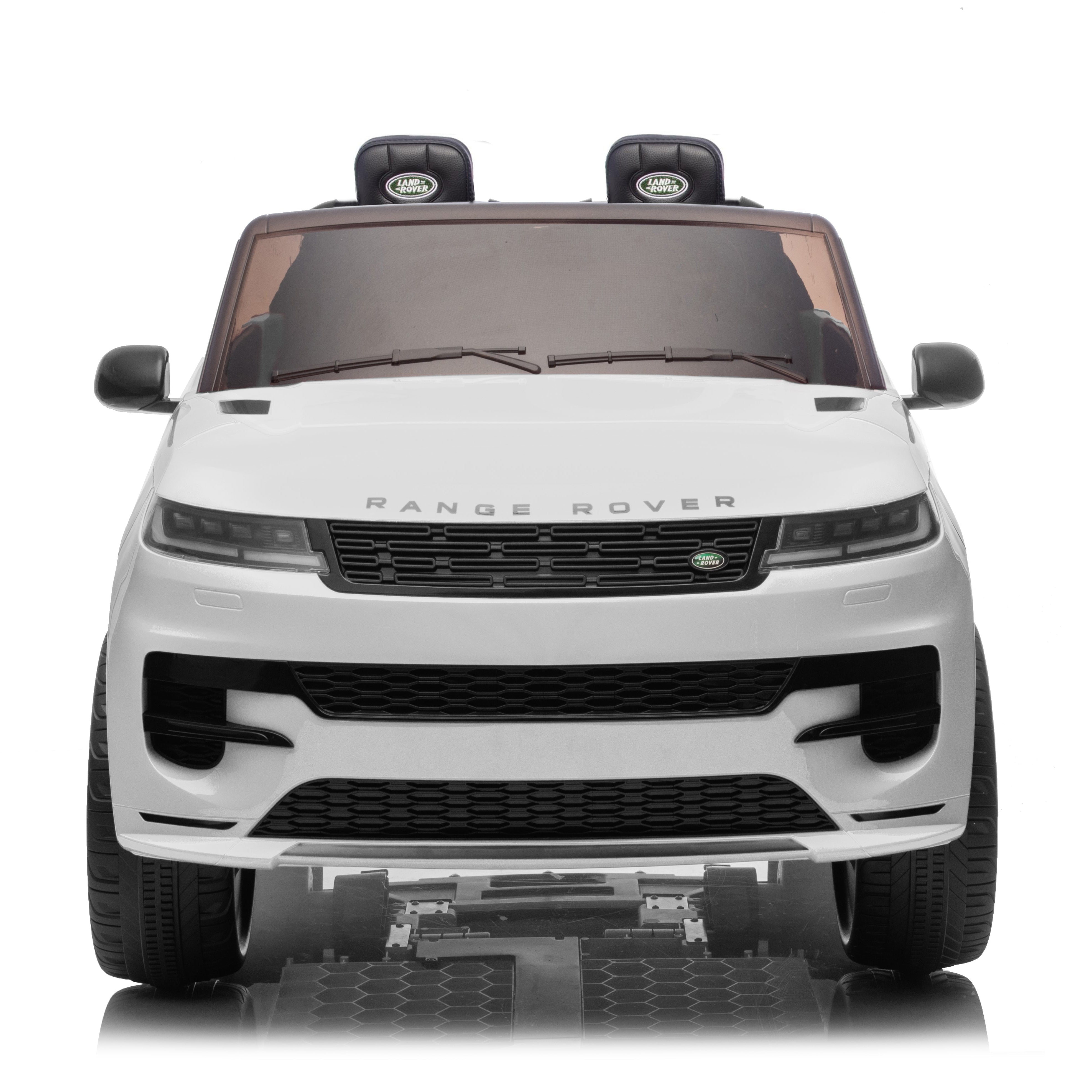 A white Range Rover children's ride-on toy car with black seats and a black front grille, shown from the front on a white background.