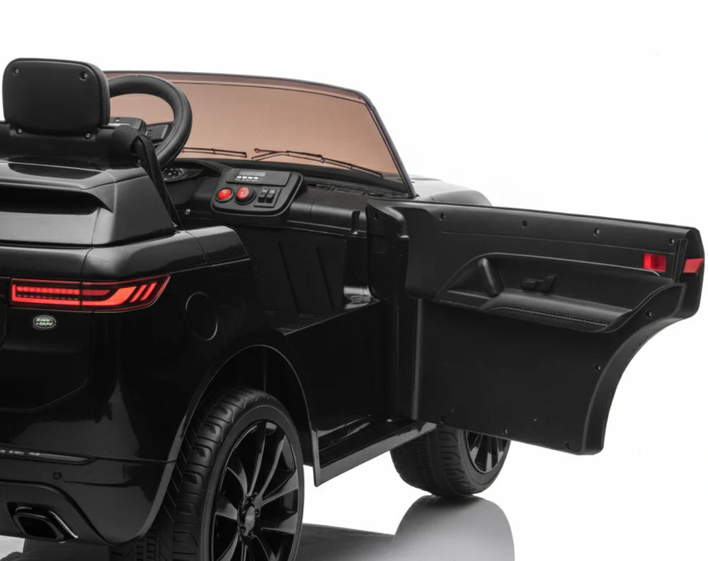 Black toy car with open door on a white background