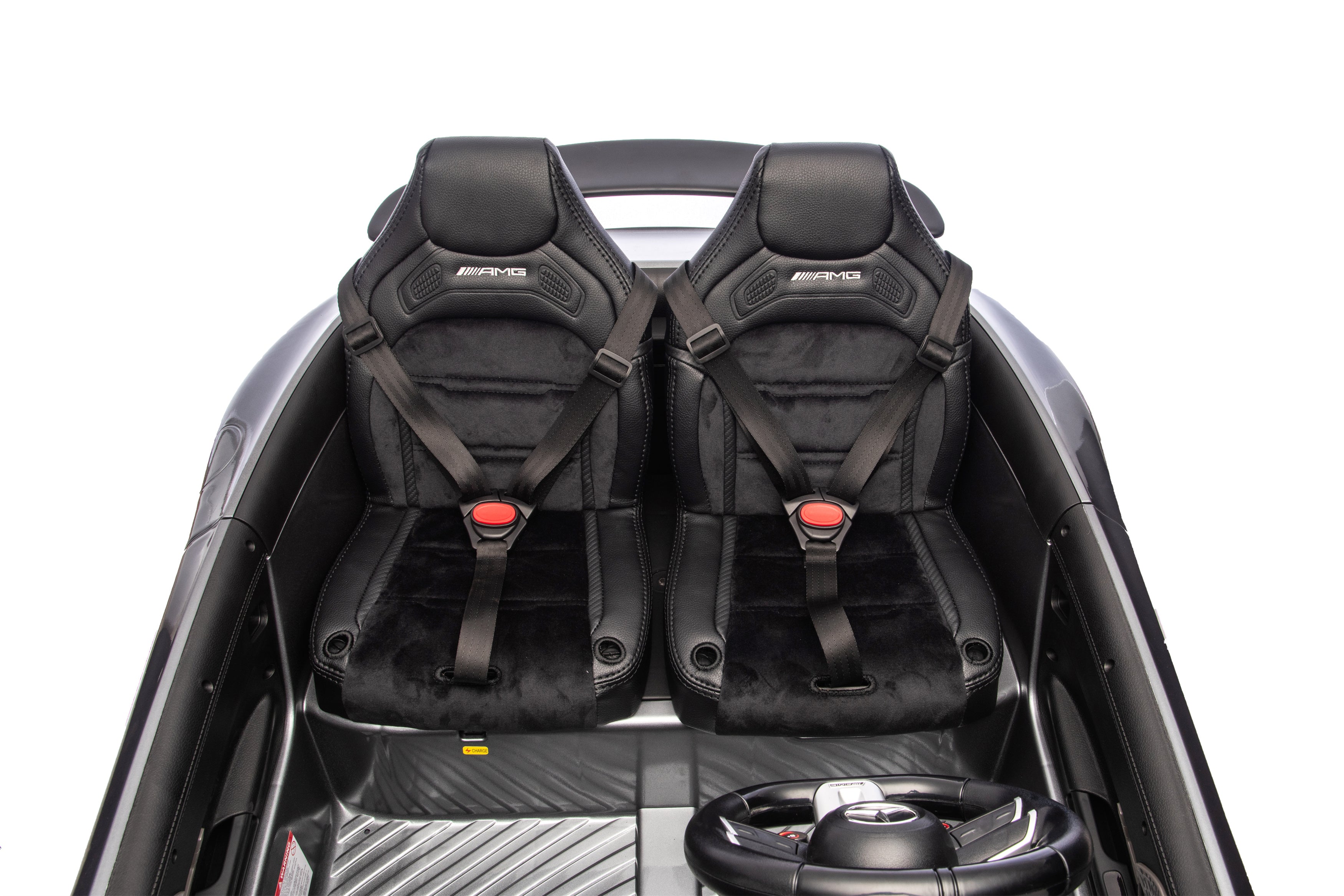 Two black car seats with seatbelts in a vehicle interior on a white background