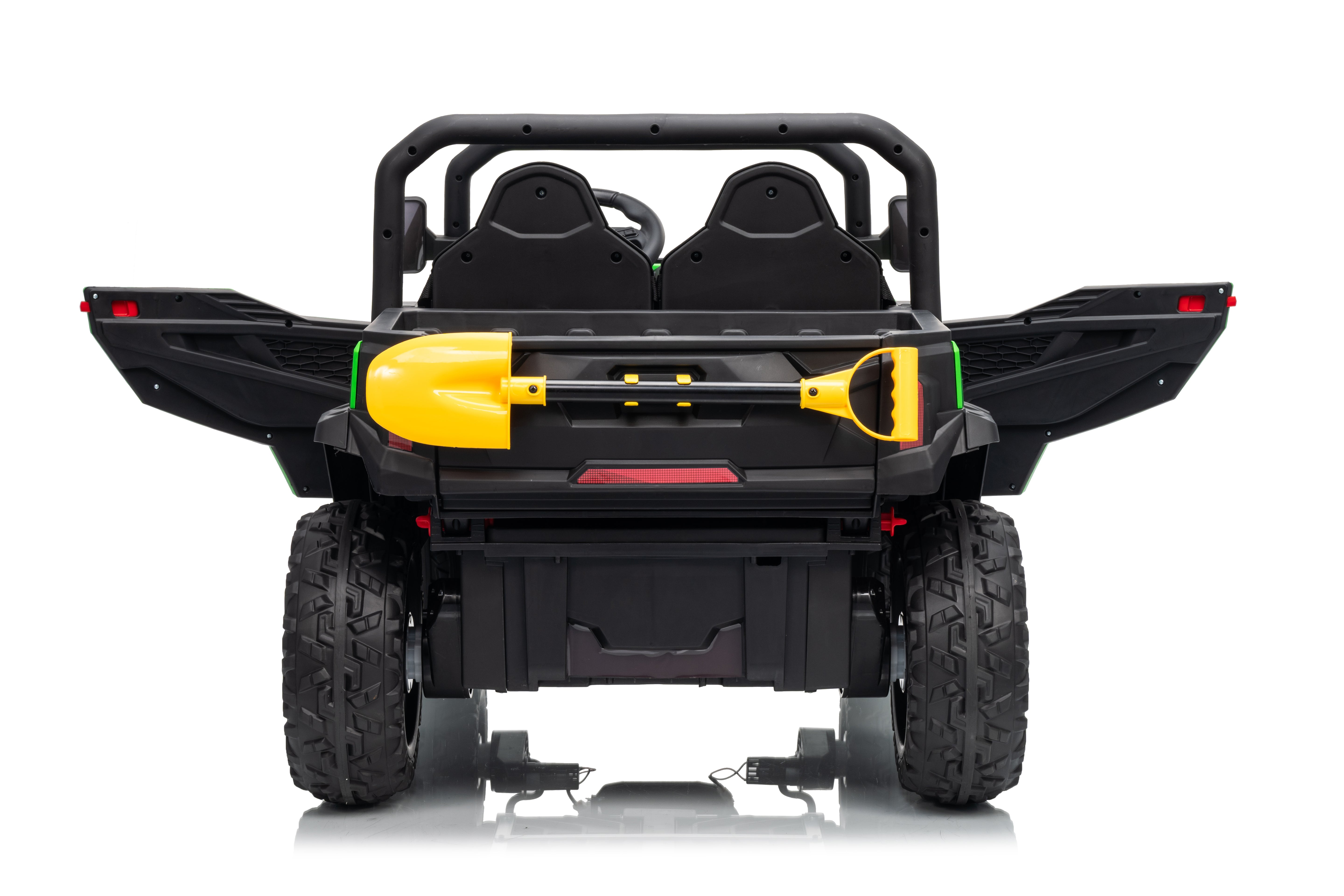 rear of tipper tray with yellow shovel
