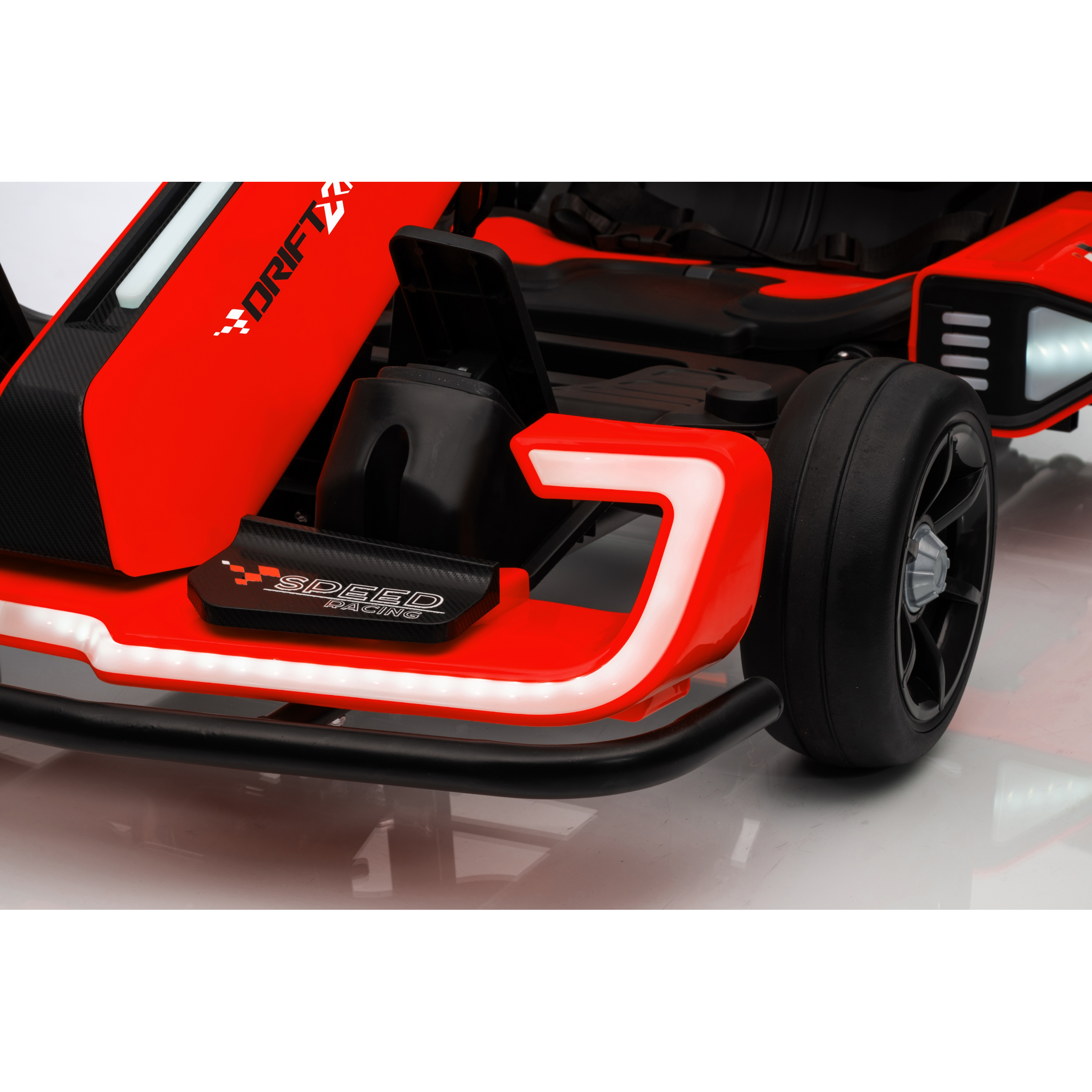 Close-up of a red and black toy car with visible branding on a white background