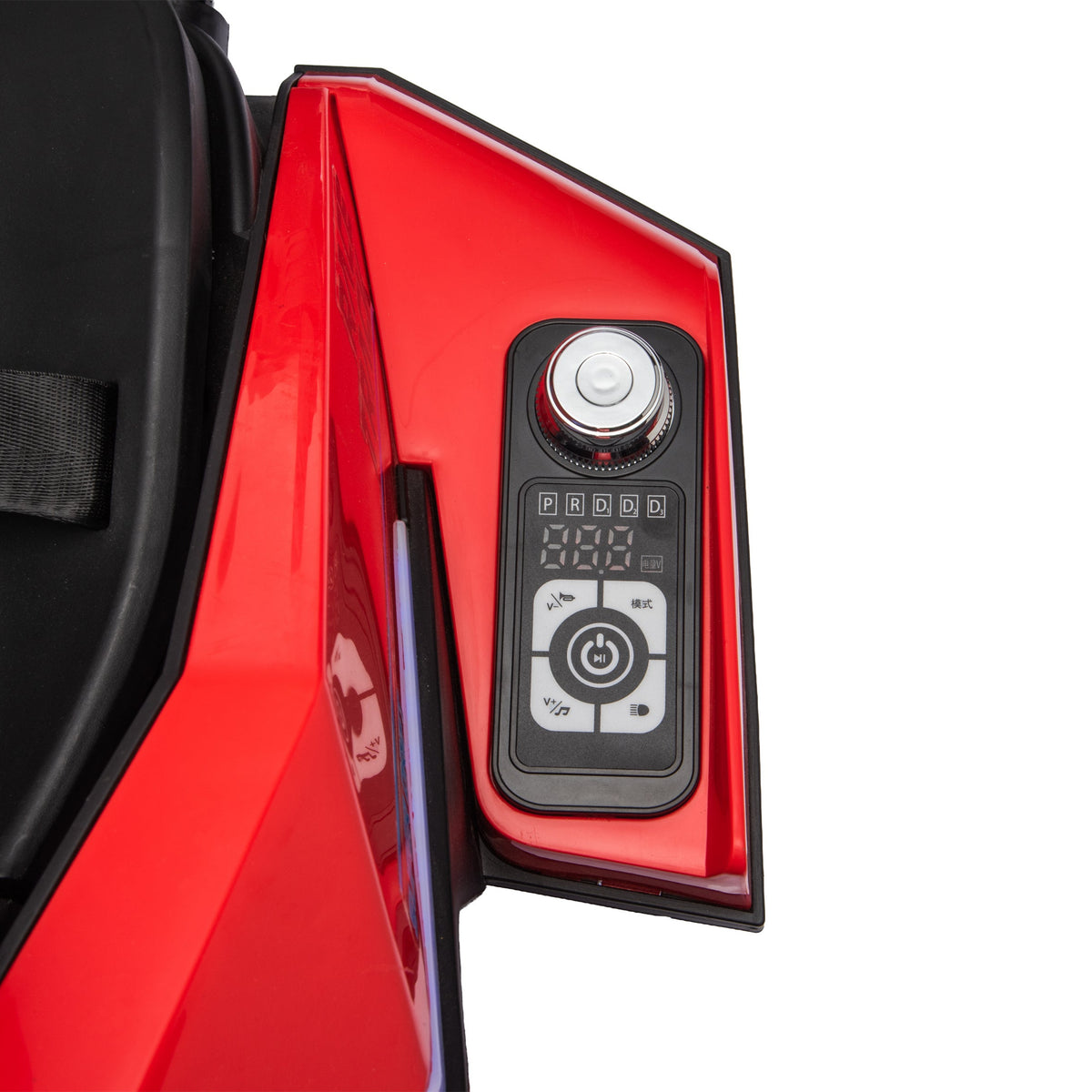 Close-up of a red vehicle or machinery panel with a black control display showing digital readouts and a rotary knob, photographed against a white background.