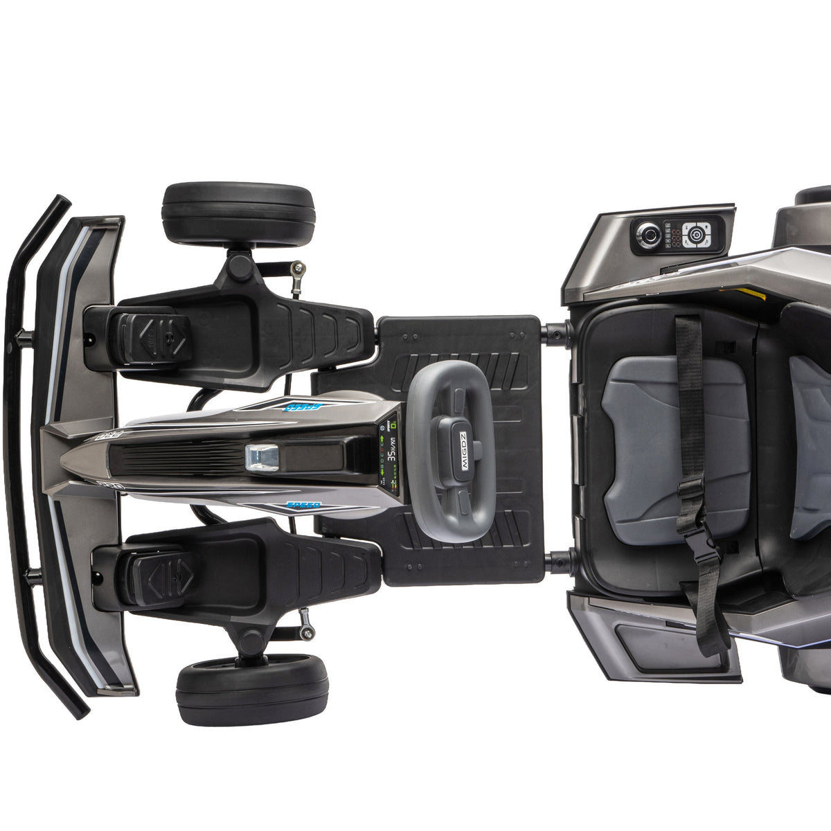 Top-down view of a black and gray go-kart with a single seat, harness, steering wheel, and visible suspension components on a white background.