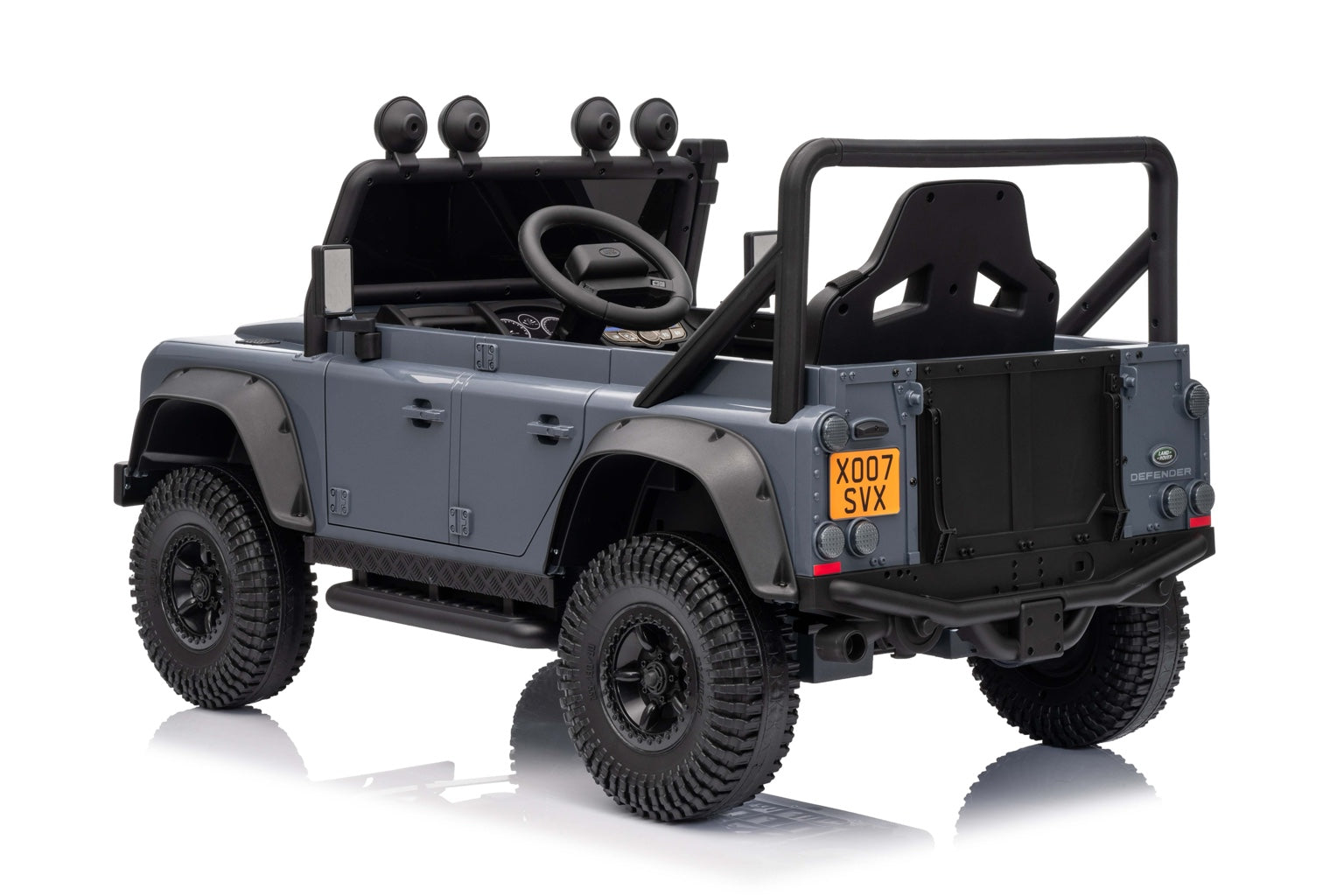 Side profile of the 24V Land Rover Defender kids electric ride-on showcasing detailed bodywork and off-road wheels.