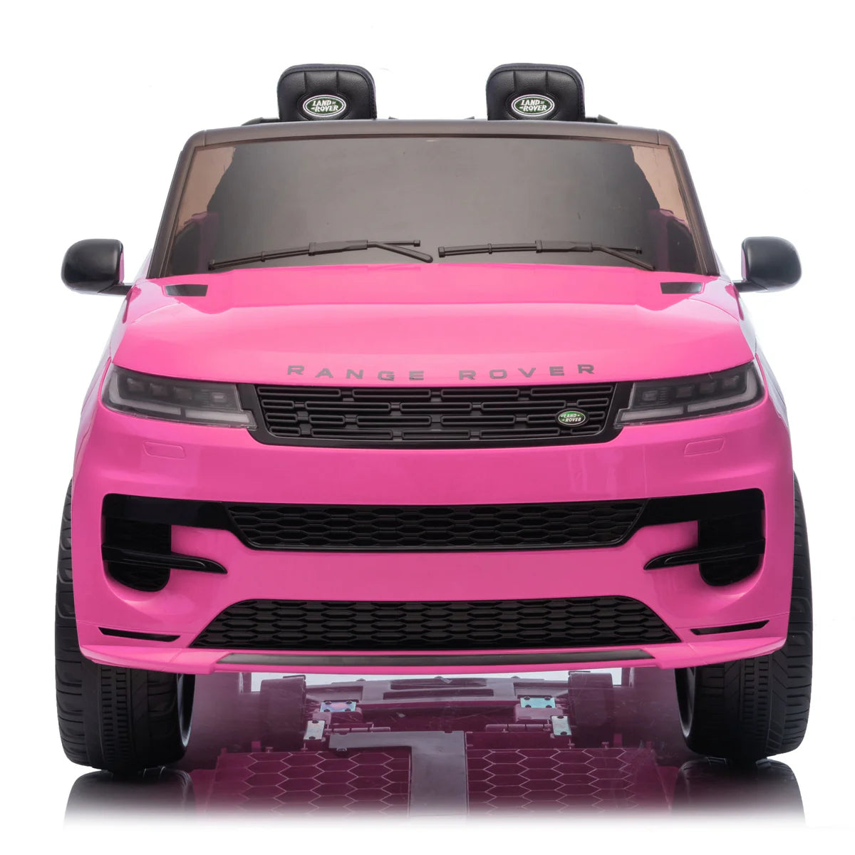 Pink toy Range Rover on a white background